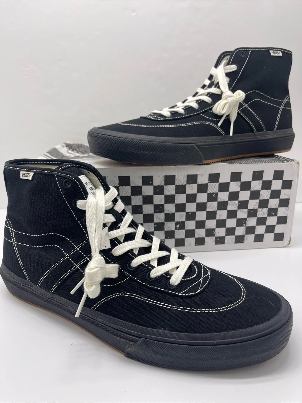 Vans Men’s High-Top Canvas Sneakers in Black and White